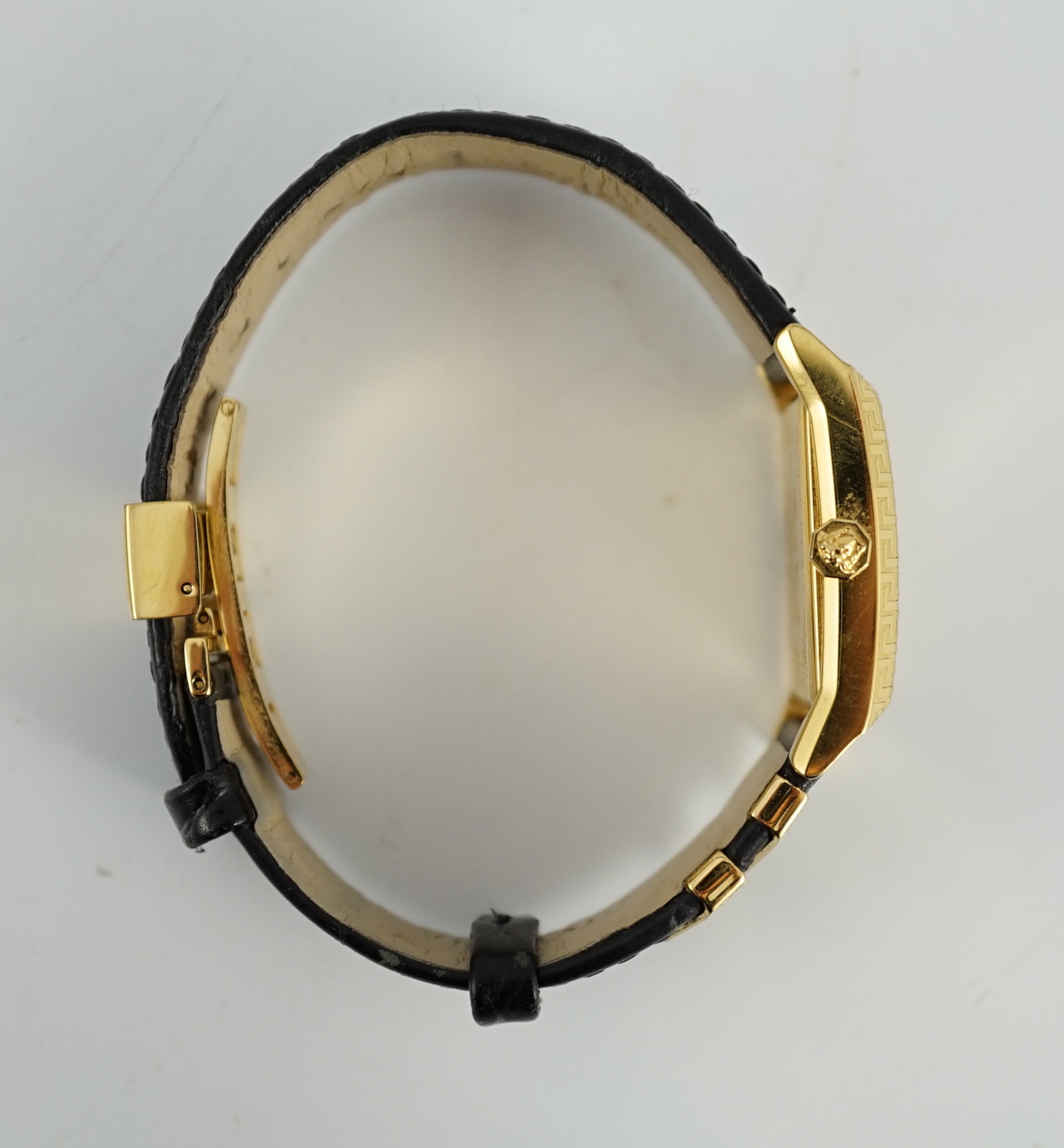 A Versace black yellow gold plated stainless steel and diamond VD25 wristwatch, case diameter 30mm, bracelet size 18cm